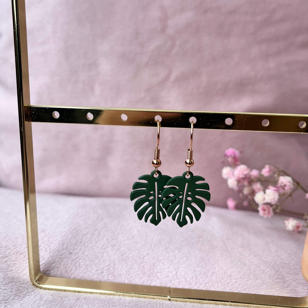 Oorhangers groen monstera blad